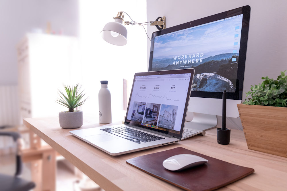 Editorial desk with a computer and creative materials for building reusable content