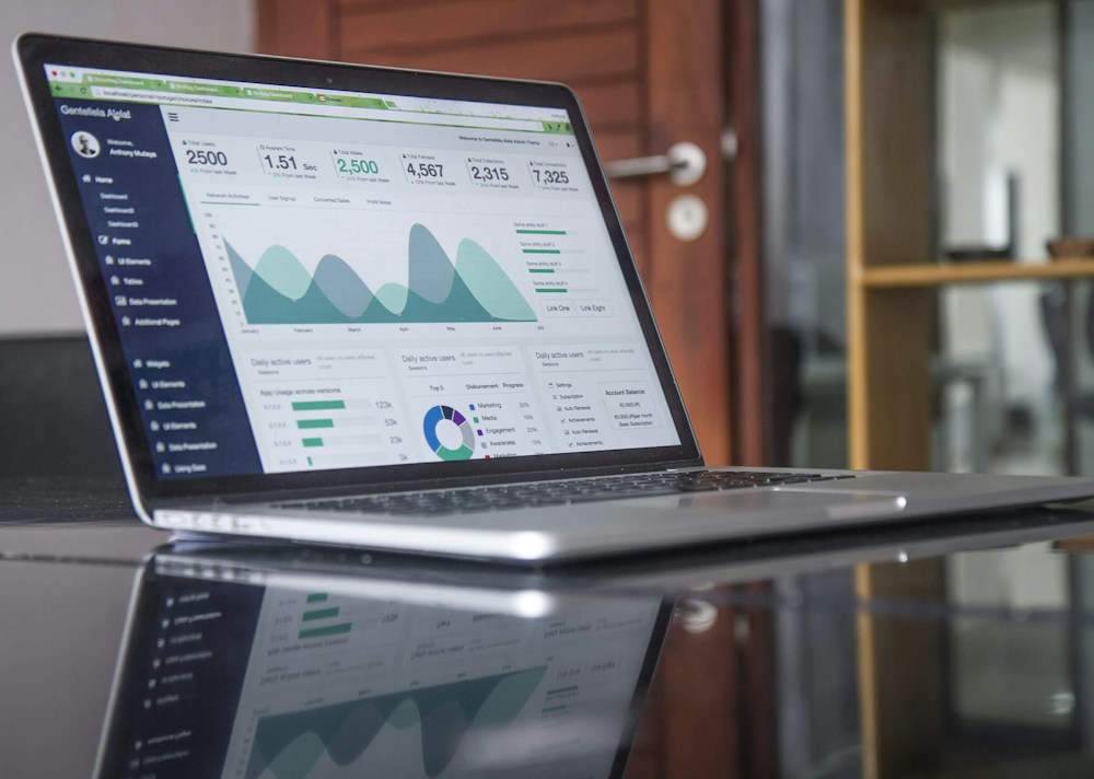 Laptop displaying website performance data used to improve conversion journeys