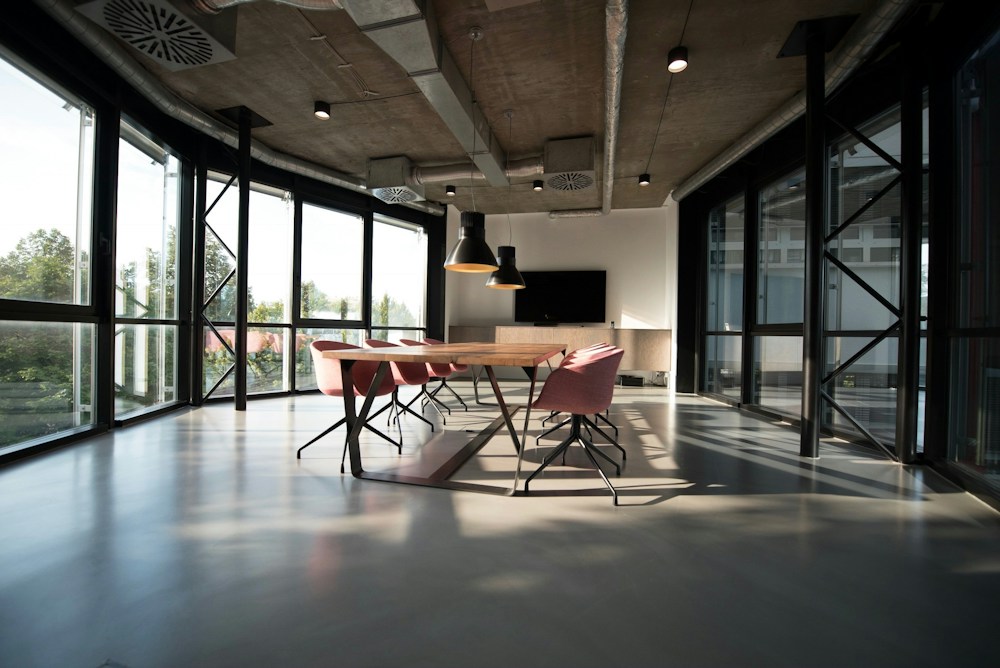 Sunlit collaborative workspace representing room for long-term brand growth